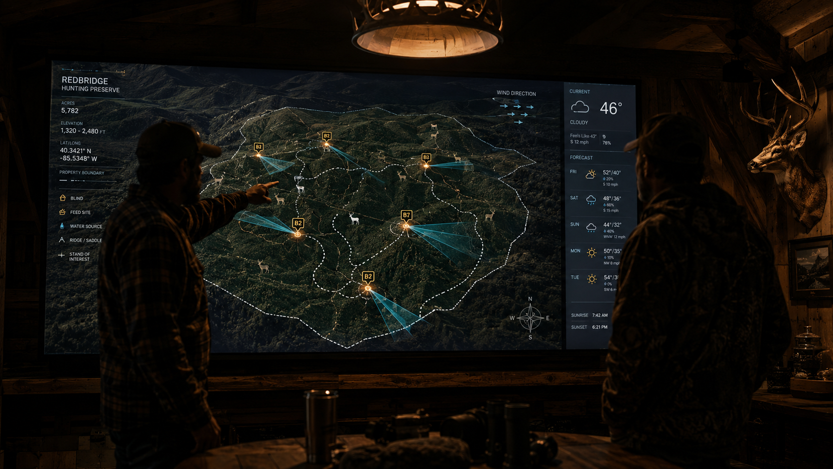 Outfitter lodge briefing room with mounted tactical display showing hunting property map - guide briefing a client pre-hunt